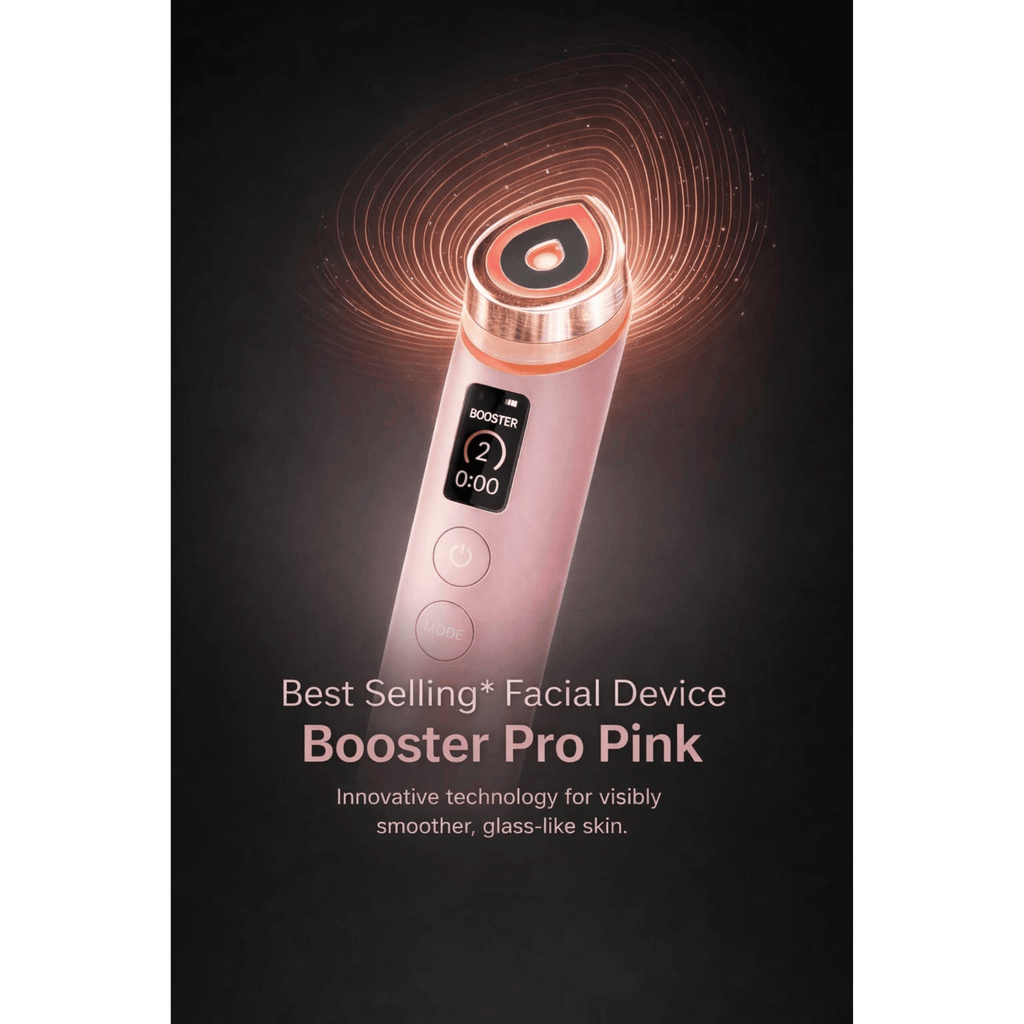 Pink facial device with text on a dark background