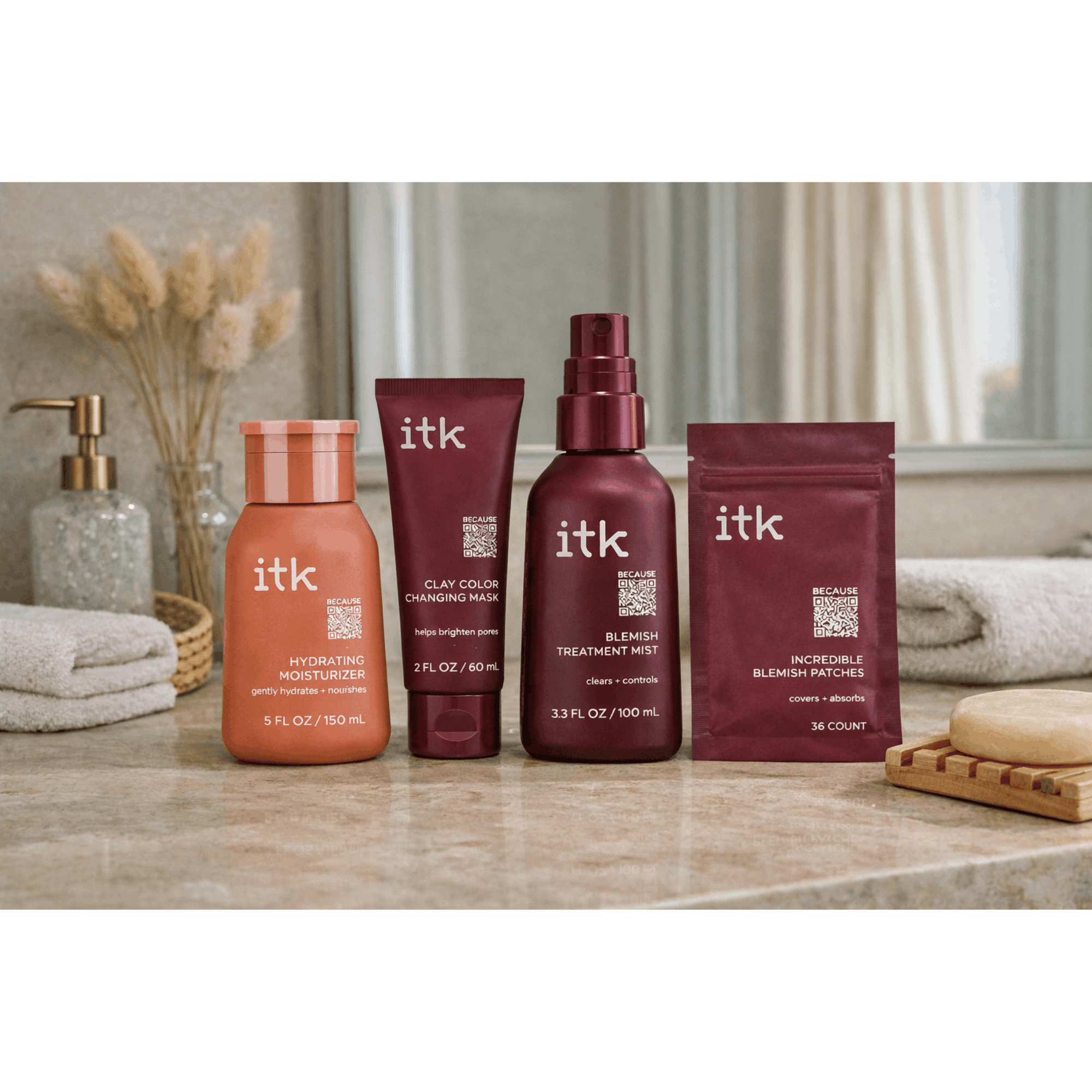 itk skincare products on a bathroom counter with a neutral background