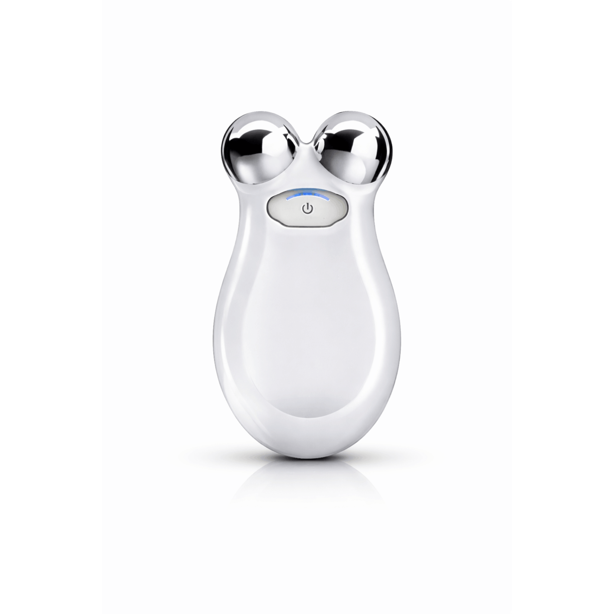 White facial massager with silver accents on a white background