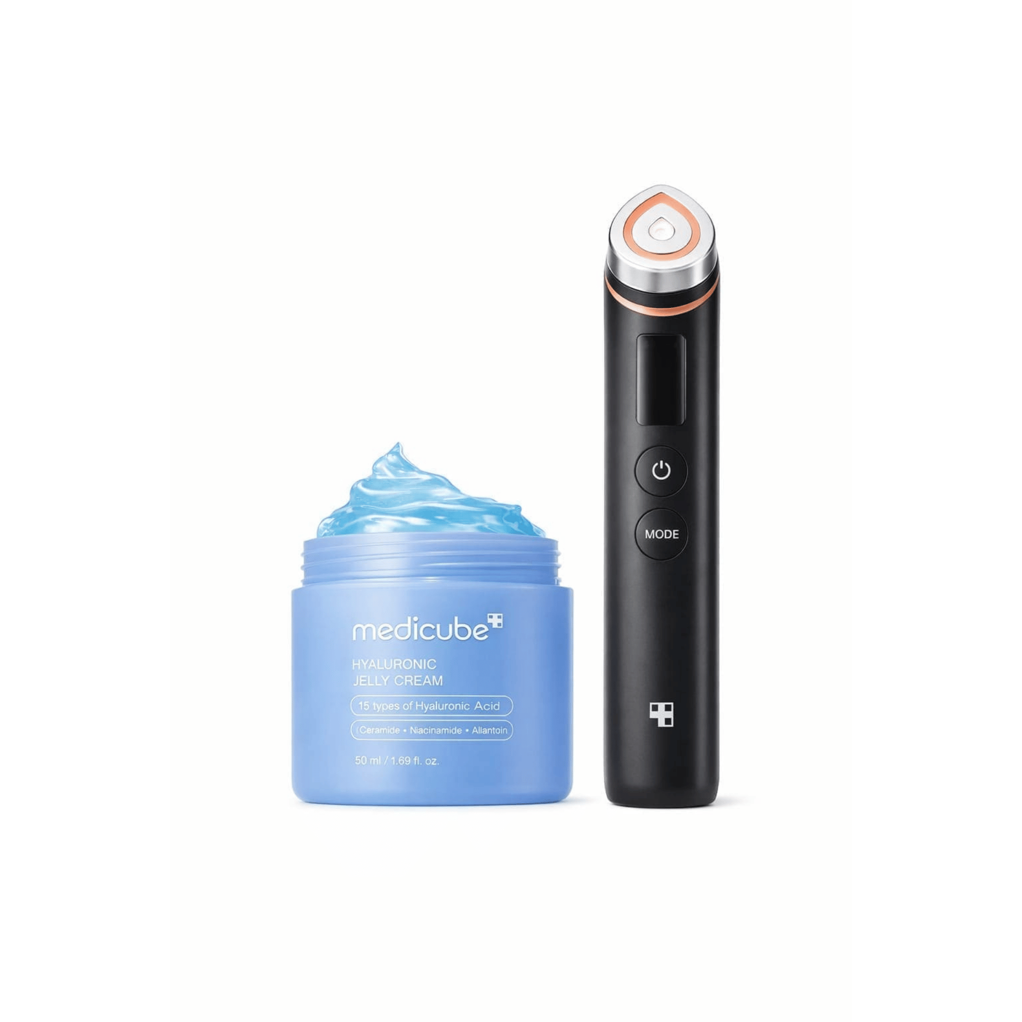 Blue jar of cream and black electronic device on a white background