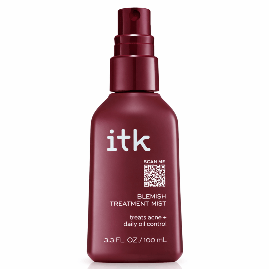 Maroon bottle of itk blemish treatment mist on a white background
