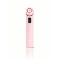 Pink electronic device with digital display on a white background